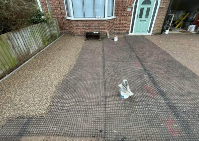 Textured resin bound surface showing underlay grid
