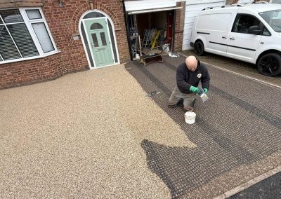 Textured resin bound surface showing underlay grid