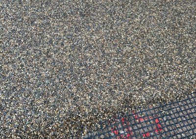 Textured resin bound surface showing underlay grid