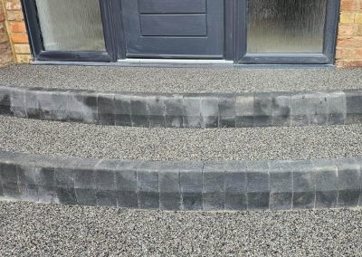 Curved steps with resin bound surface